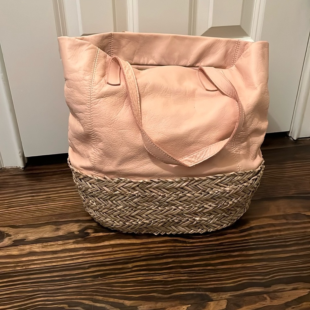 Pink leather bag with grass bottom